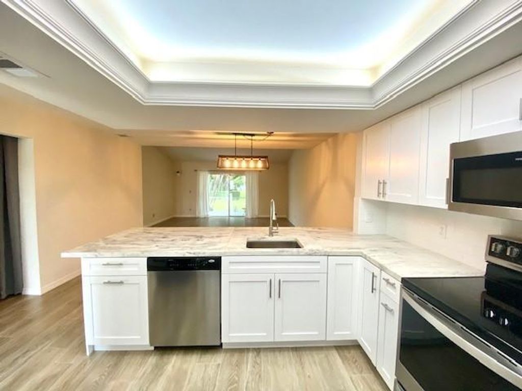 Photo of 122 Doe Trail Trl, Jupiter, FL 33458 (MLS # R10720961)