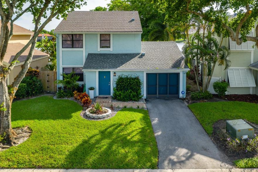 INCREDIBLE VALUE! Perfect home featuring 3 bedrooms + a den/office and 3 baths with a lake view! Perfectly situated amongst shopping, restaurants, schools, and major transportation including i95 and The Turnpike. This property is private and quiet on a dead-end cul de sac street. Entertain friends and family in your large, lakefront backyard with firepit and covered patio. The first floor features a large living room, guest bedroom (converted garage) and den/office. 2nd floor master bedroom and full guest suite. HOA INCLUDES ROOF MAINTENANCE, exterior insurance, lawn care and community pool. Excellent for first time homebuyers!