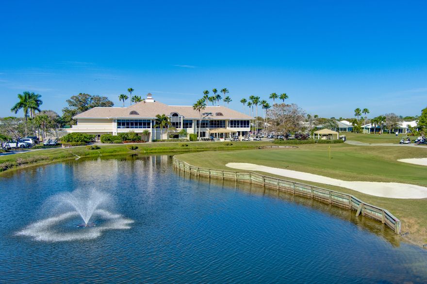 Welcome to this beautifully updated 3 bedroom, 2 bath home with a 2 car garage with golf cart storage, offering over 2,100 square feet under air and soaring 10 foot ceilings throughout. Designed for both comfort and entertaining, this spacious residence features a living room, family room, den, dining/wet bar area, along with a updated screened lanai with serene water views. Partially refurbished in 2021, the home boasts travertine flooring, newer stainless steel kitchen appliances with 500 gallon propane gas tank, pantry cabinetry with all soft touch drawers. a dual-fuel cooktop & oven. Pull out microwave drawer.  Major updates include a new Roof in 2022 with secondary protection, new fascia and rain gutters with leaf screens on gutters. Exterior home painted, patio tile and Screen enclosure in 2023. Additional highlights include a WHOLE house generator, Full house water softener, reverse osmosis system, instant hot water recirculation, surge protection, and abundant storage with a floored attic and built-in garage systems. Located in a gated community with 24-hour security, accordion shutters, Included in HOA -landscaping, exterior maintenance, painting, fiber optics cable & internet, this home offers both luxury, peace of mind, and much more.