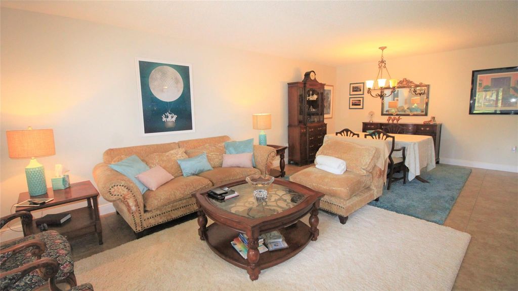 Photo of 2240 N Cypress Bend #104, Pompano Beach, FL 33069 (MLS # F10478605)