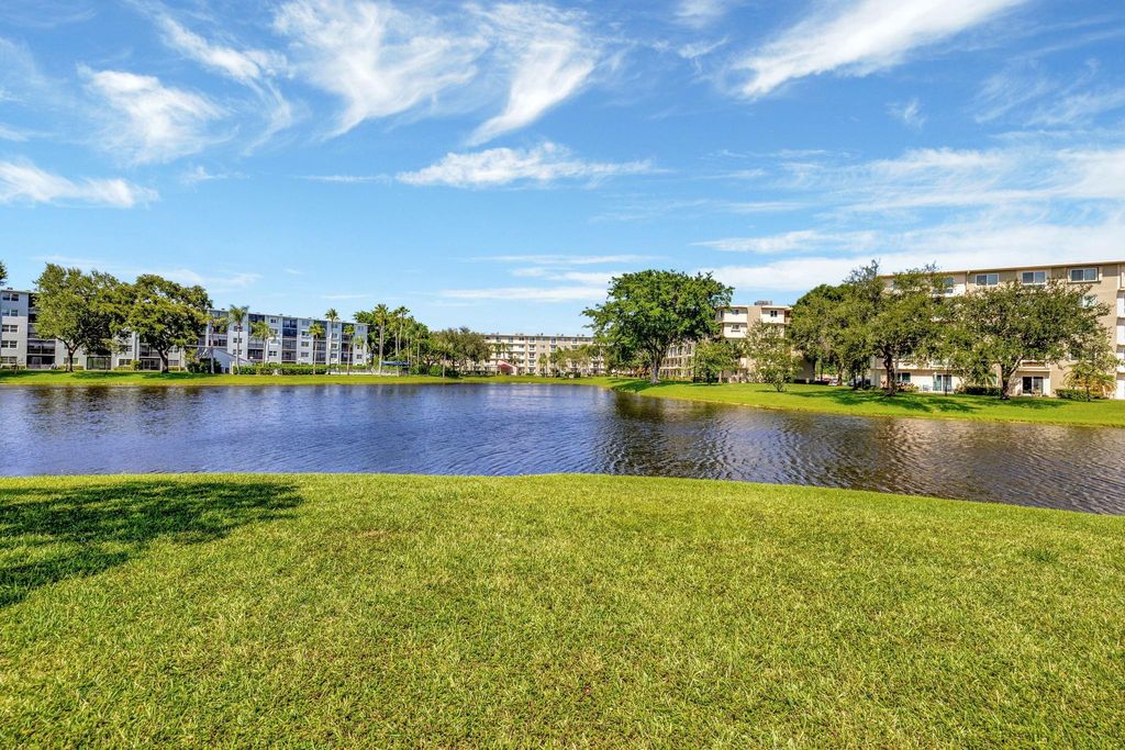 Photo of 2240 N Cypress Bend #104, Pompano Beach, FL 33069 (MLS # F10478605)