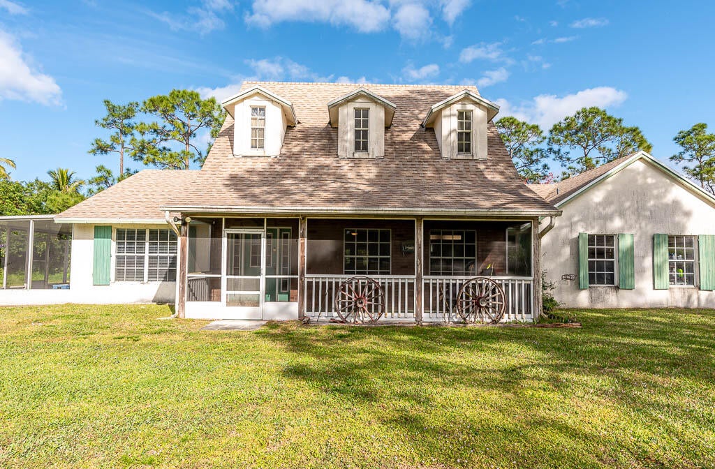 Photo of 9955 Grapeview Boulevard, West Palm Beach, FL 33412 (MLS # R10958775)