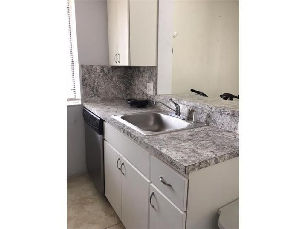 Photo of 3277 Coral Lake Drive #3277, Coral Springs, FL 33065 (MLS # F10471189)