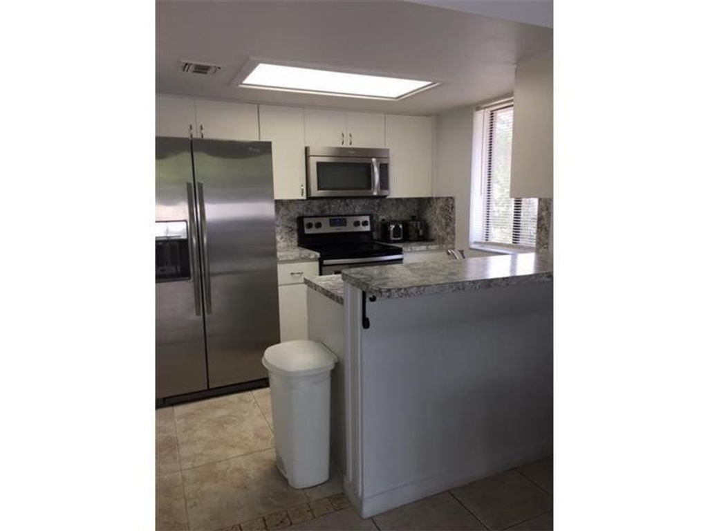 Photo of 3277 Coral Lake Drive #3277, Coral Springs, FL 33065 (MLS # F10471189)