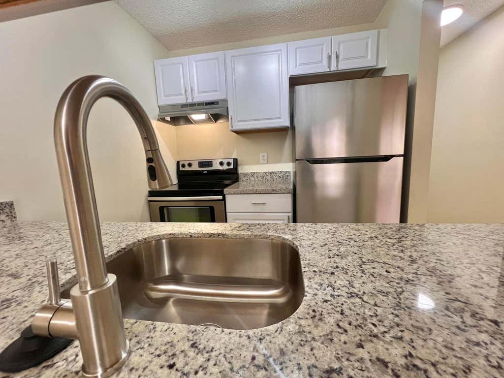 Photo of 6061 N 10th Ave Avenue N #242, Greenacres, FL 33463 (MLS # B26040963)