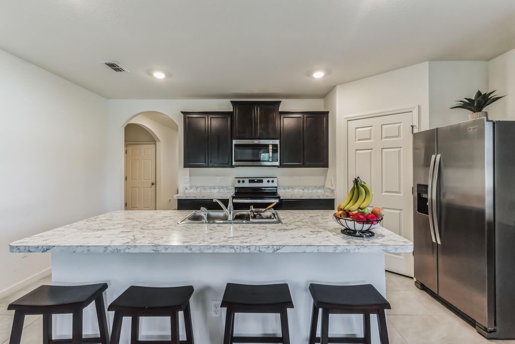 Photo of 1085 SW Paar Drive, Port Saint Lucie, FL 34953 (MLS # R11002825)