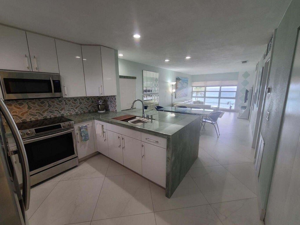 Photo of 3851 N Ocean Boulevard #409, Gulf Stream, FL 33483 (MLS # R11023733)