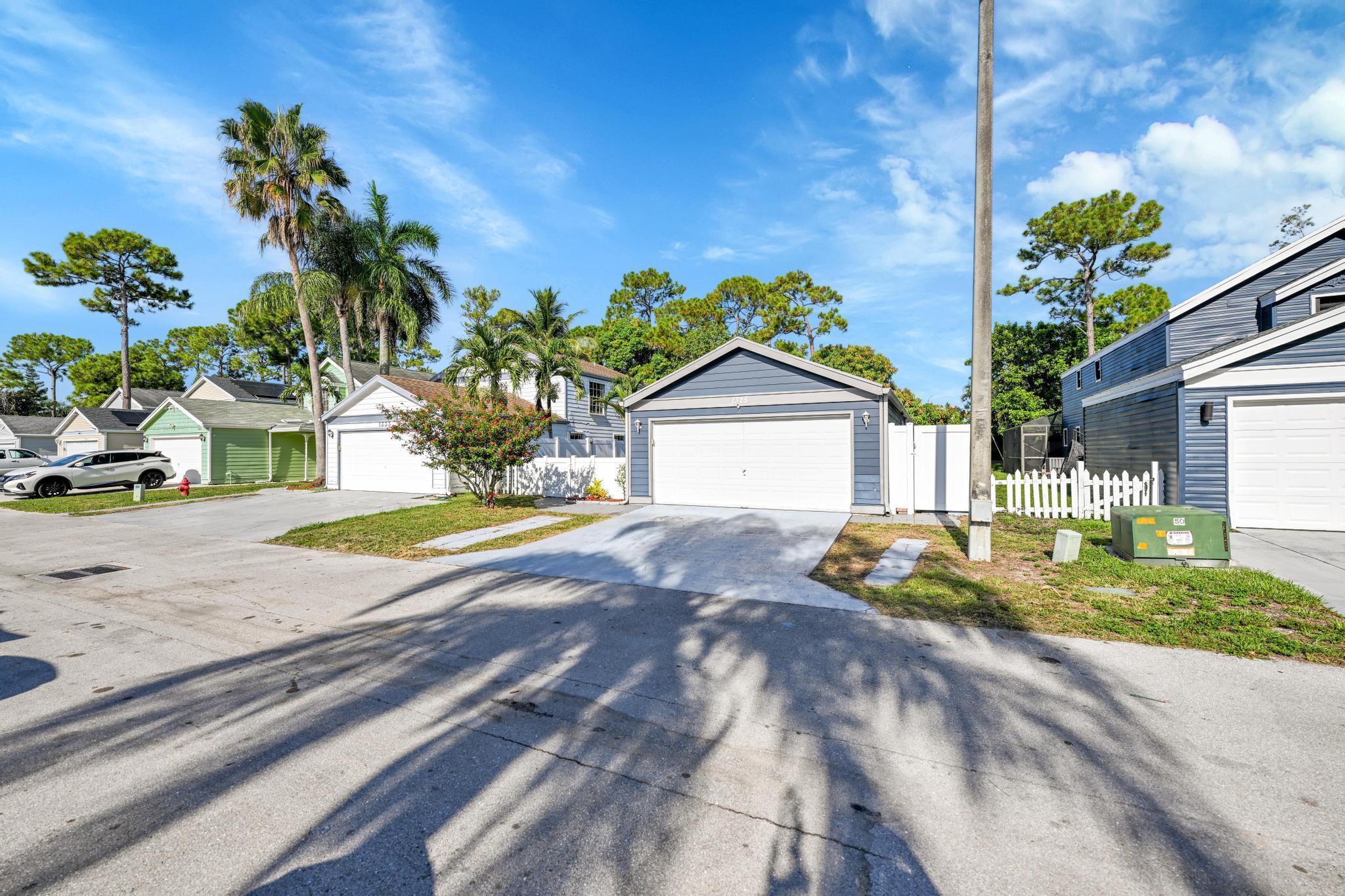 Welcome to Victoria Woods - thriving, gated community in heart of Palm Beach County! Built in 1980s, neighborhood known for its central location, mature landscaping and well-maintained single-family homes. Charming residence offers a split floor plan w/2 spacious bdrms and 2 full baths + a versatile third room currently being used as a bdrm with queen-size bed. It can easily serve as a home office, playroom, or formal dining space depending on your needs. Updated kitchen is flooded w/natural light featuring eat-in dining, framed by a lovely bay window--perfect for morning coffee. Enjoy the peace and privacy of the 8-foot vinyl fencing surrounding the property, along w/ a screened-in patio. large garage offers ample storage, backyard has just enough space.no interior steps, paved perimeter
