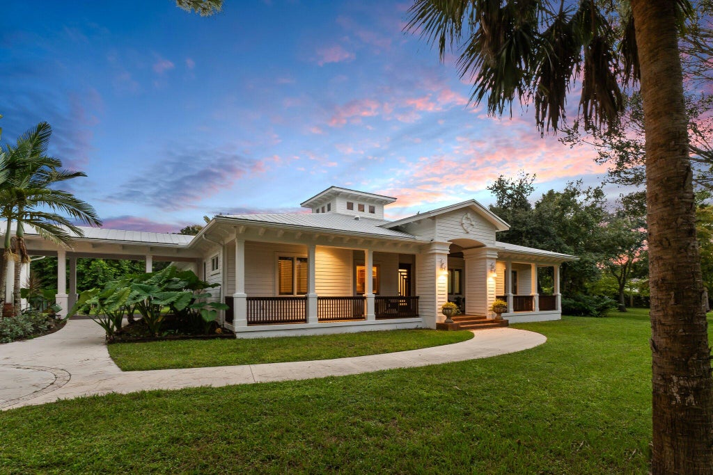 Photo of 6130 SW Gator Trail, Palm City, FL 34990 (MLS # R11032677)