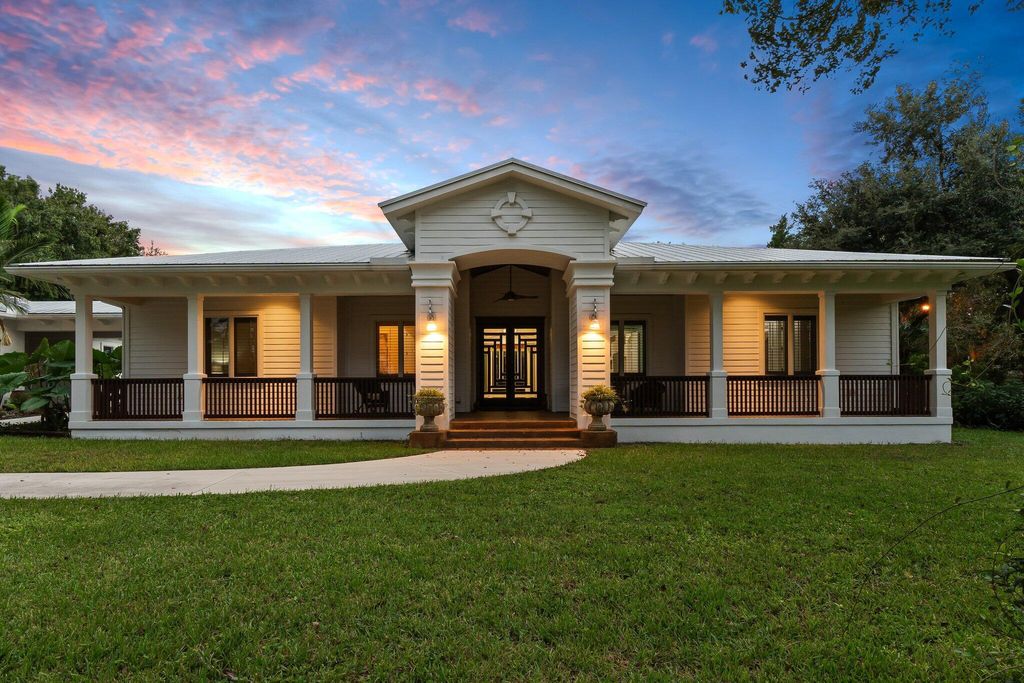 Photo of 6130 SW Gator Trail, Palm City, FL 34990 (MLS # R11032677)