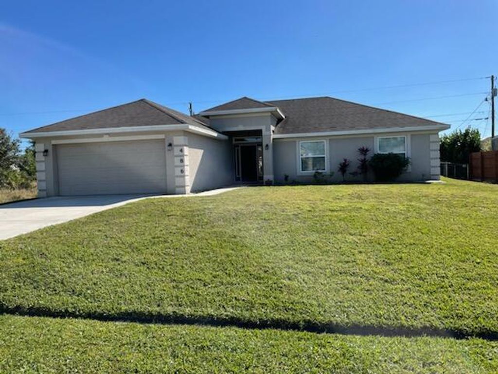 Photo of 486 SW Kaabe Avenue, Port Saint Lucie, FL 34953 (MLS # R10766418)