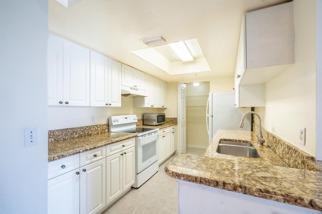 Photo of 1300 Crestwood Court S #1304, Royal Palm Beach, FL 33411 (MLS # R11127615)