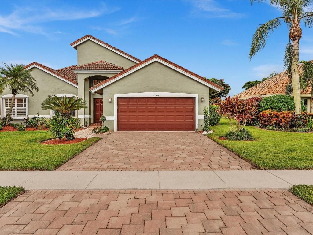 Photo of 6004 Golf Villas Drive, Boynton Beach, FL 33437 (MLS # R11123539)