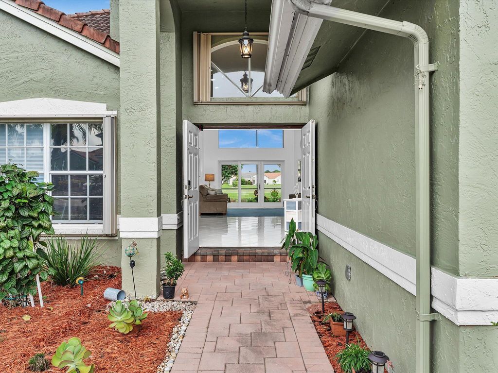 Photo of 6004 Golf Villas Drive, Boynton Beach, FL 33437 (MLS # R11123539)