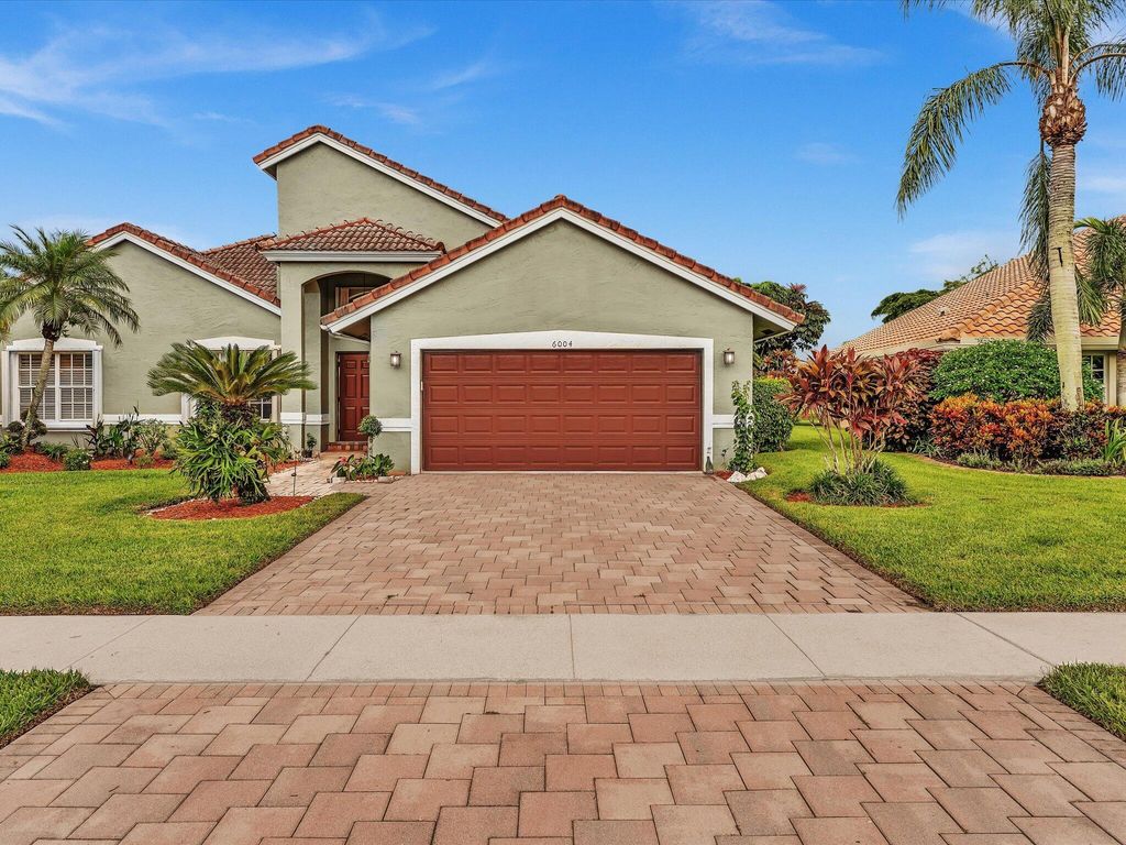 Photo of 6004 Golf Villas Drive, Boynton Beach, FL 33437 (MLS # R11123539)