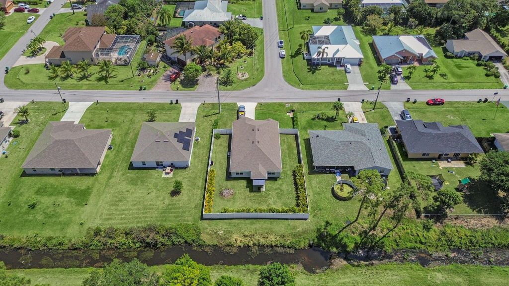 Photo of 3286 SW Martin Street, Port Saint Lucie, FL 34953 (MLS # R11077982)