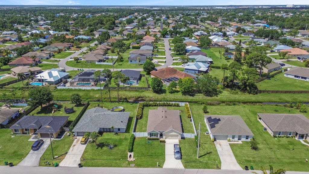 Photo of 3286 SW Martin Street, Port Saint Lucie, FL 34953 (MLS # R11077982)