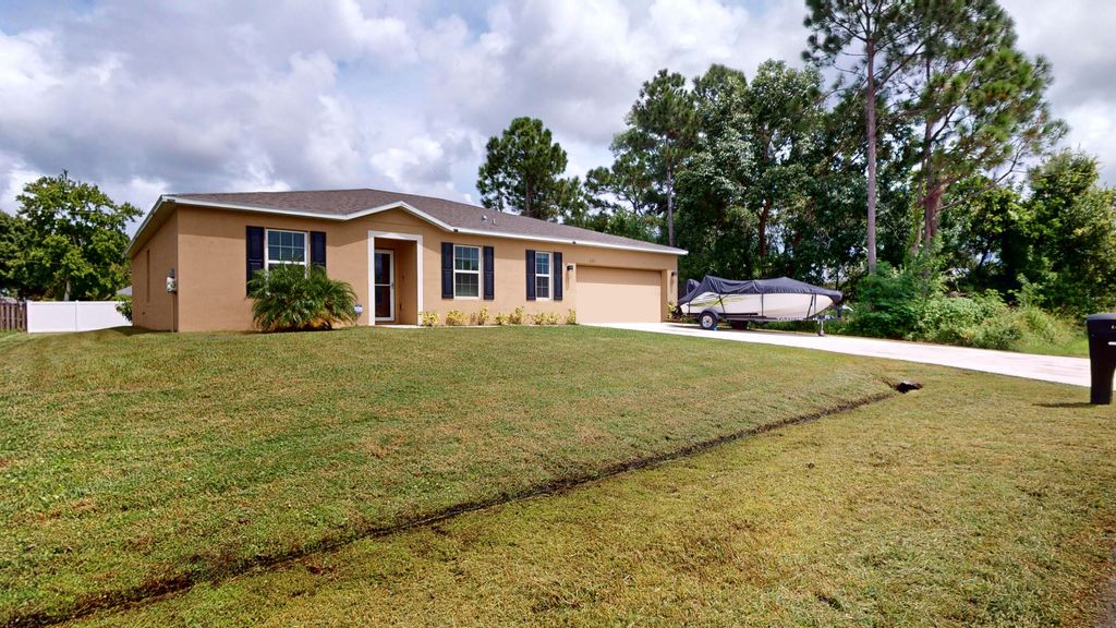 Photo of 155 SW Donna Terrace, Port Saint Lucie, FL 34984 (MLS # R11017274)