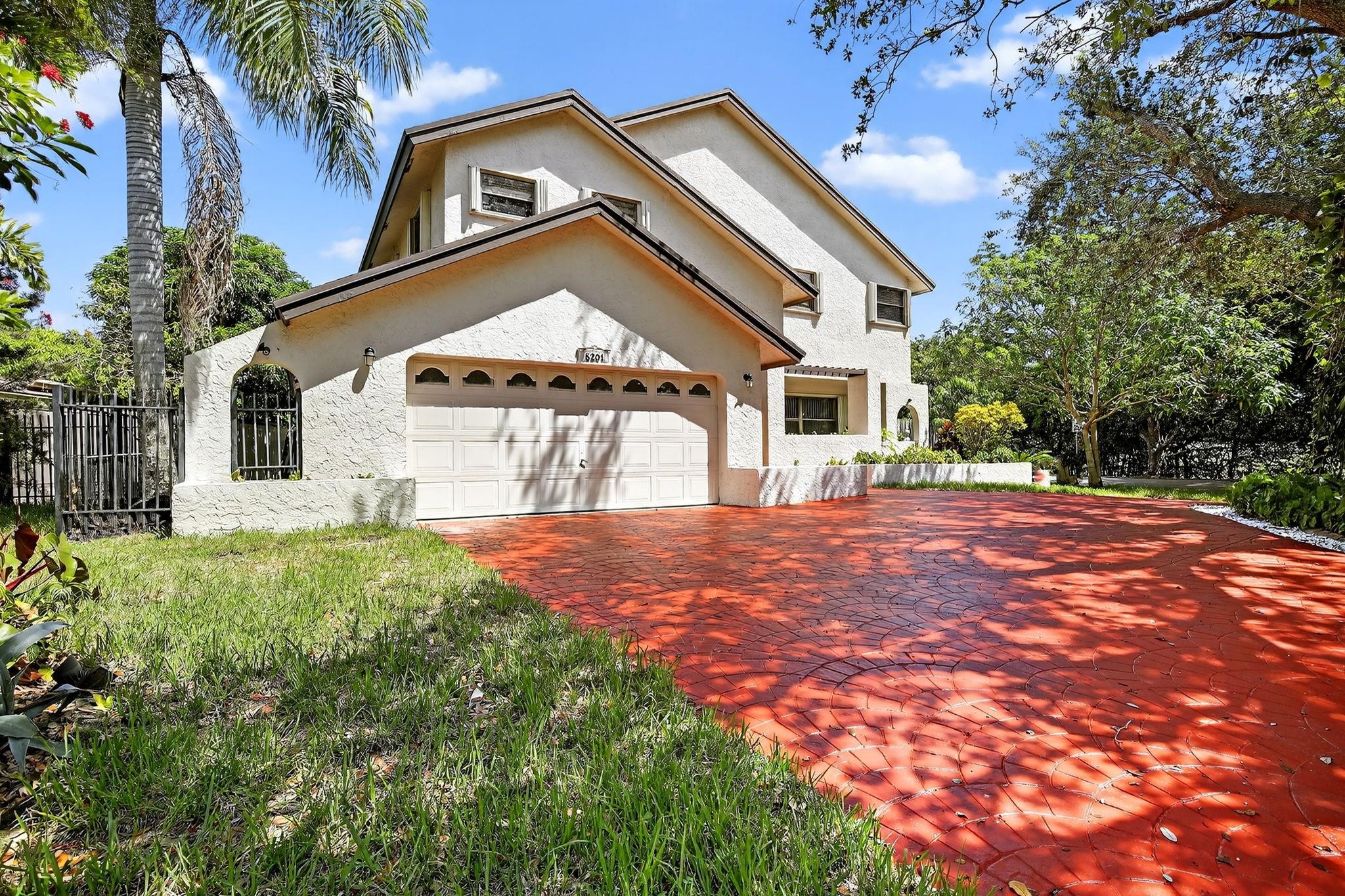 STUNNING CORNER LOT LAKEFRONT RENTAL! This spacious home offers the perfect blend of luxury and convenience. Relax by your private resort-style pool featuring an elegant waterfall while enjoying direct lake view. The master suite retreat boasts a beautiful balcony overlooking both pool and lake, plus oversized walk-in closets, d bathroom with double vanities & glass enclosed shower, and indulgent Jacuzzi tub for ultimate relaxation. Well-maintained property features accordion shutters for peace of mind. Room in back of house with separate entrance - perfect for a home office. Prime location puts you steps from popular shopping and dining destinations. Excellent schools serve all grade levels. Ready for immediate occupancy. Don't miss this one!