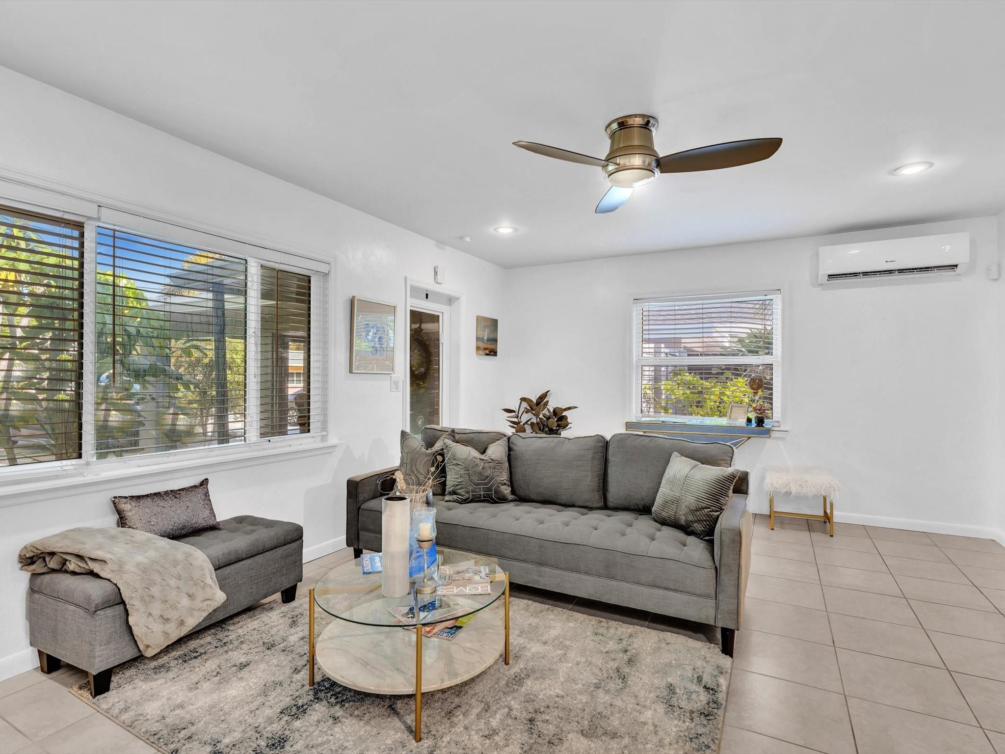 Charming early midcentury 2BD/2.5BA + convertible den on Lake Ridge’s only lake! Enjoy tropical pool views from your dining room and breathtaking sunsets from the deck as flocks of Ibis return to a protected wildlife sanctuary. Features a sleek new Euro kitchen with stainless steel appliances, wine bar with fridge, and mostly impact windows/doors. Deeded lakefront (60+ ft) with no rear neighbors for total privacy. Just 2 miles to the beach and Galleria Mall and close to Airport and Cruise Terminal. A rare blend of nature, style, and location. PROFESSIONAL PHOTOS COMING SOON!