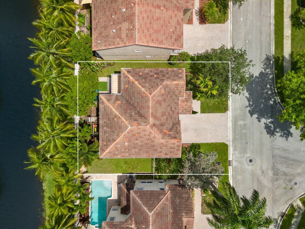 Photo of 648 NW 127th Avenue, Coral Springs, FL 33071 (MLS # B26013983)