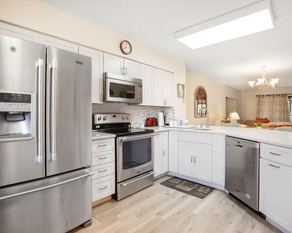 Photo of 2334 S Cypress Bend Drive #302, Pompano Beach, FL 33069 (MLS # F10537103)