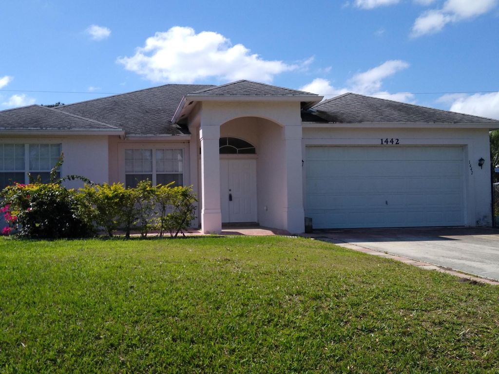 Photo of 1442 SW Dow Lane, Port Saint Lucie, FL 34953 (MLS # R10975698)