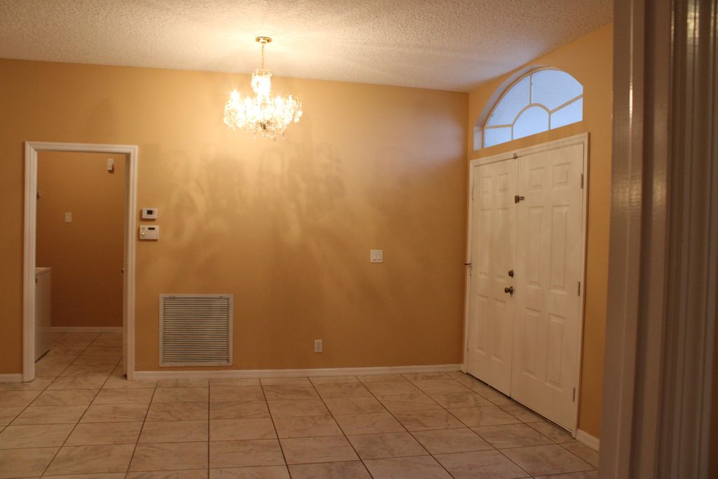 Photo of 1442 SW Dow Lane, Port Saint Lucie, FL 34953 (MLS # R10975698)