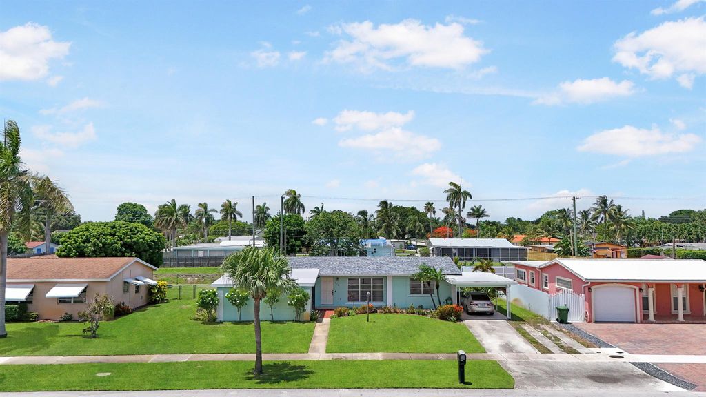 Photo of 316 Pinehurst Road, Palm Springs, FL 33461 (MLS # R10998384)