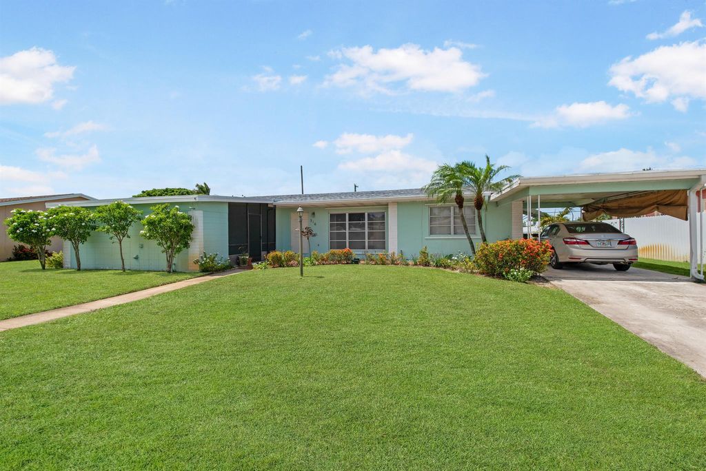 Photo of 316 Pinehurst Road, Palm Springs, FL 33461 (MLS # R10998384)