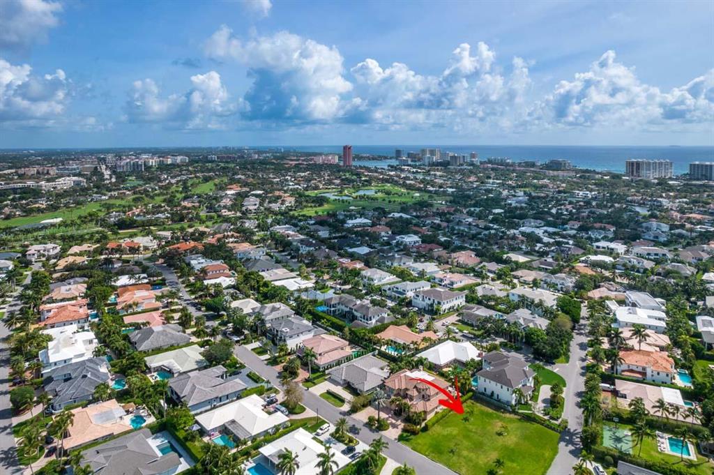Great opportunity to build your dream home on an oversized corner lot in Royal Palm Yacht & Country Club.