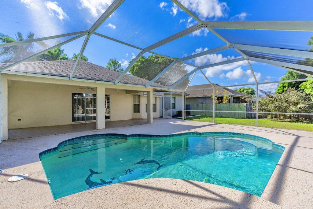 Photo of 967 SE Browning Avenue, Port Saint Lucie, FL 34983 (MLS # R11149600)