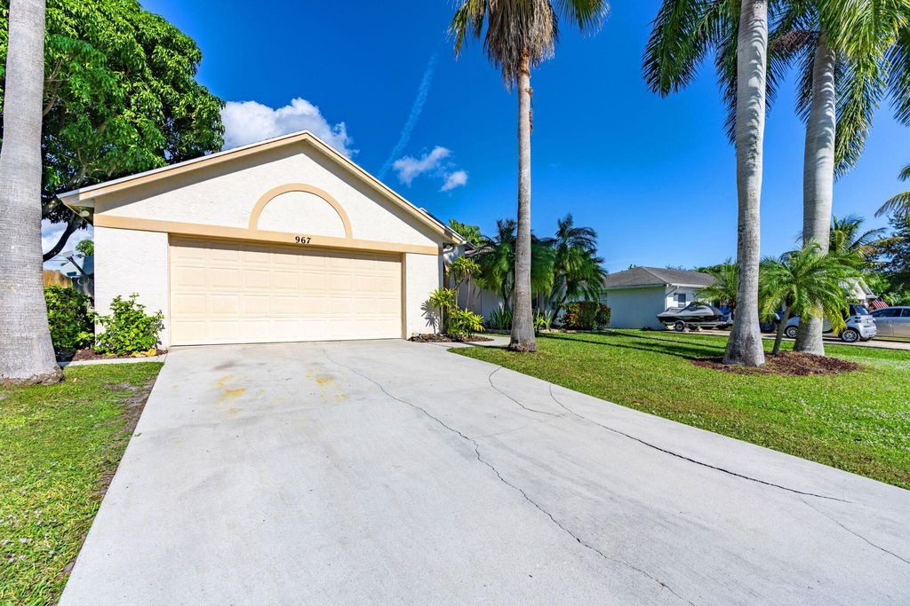 Photo of 967 SE Browning Avenue, Port Saint Lucie, FL 34983 (MLS # R11149600)