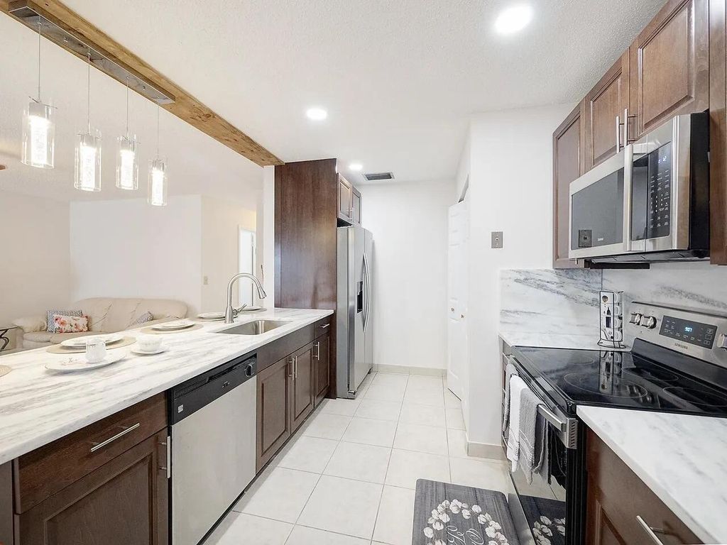 Photo of 14629 Candy Way, Delray Beach, FL 33484 (MLS # R11002661)