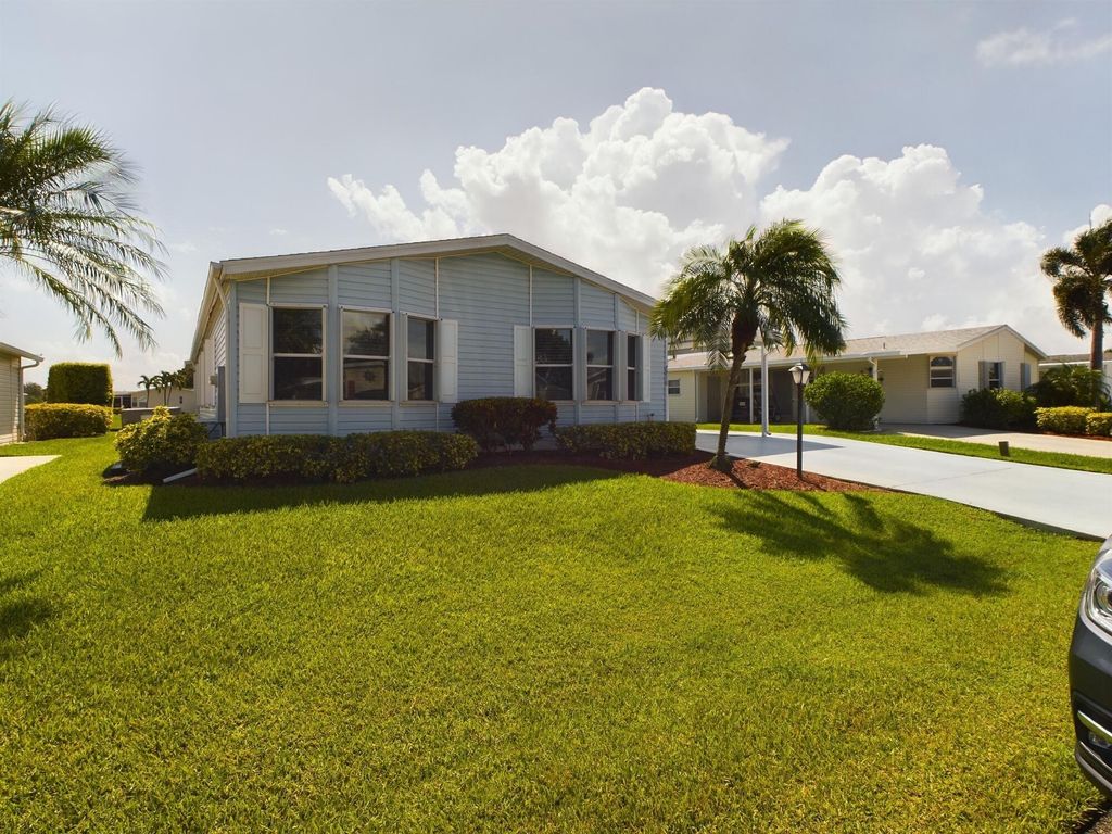 Photo of 7916 Meadowlark Lane, Port Saint Lucie, FL 34952 (MLS # R10915325)