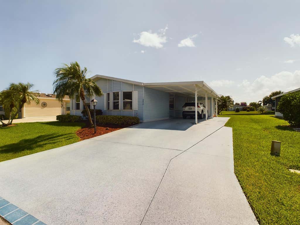 Photo of 7916 Meadowlark Lane, Port Saint Lucie, FL 34952 (MLS # R10915325)