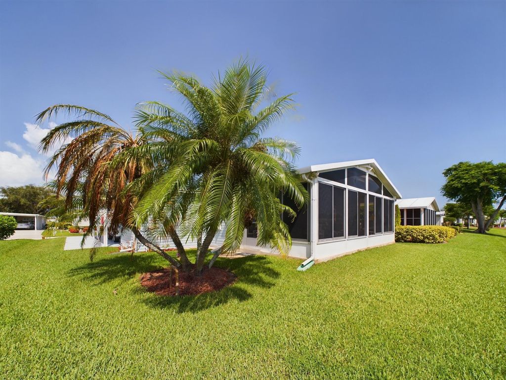 Photo of 7916 Meadowlark Lane, Port Saint Lucie, FL 34952 (MLS # R10915325)