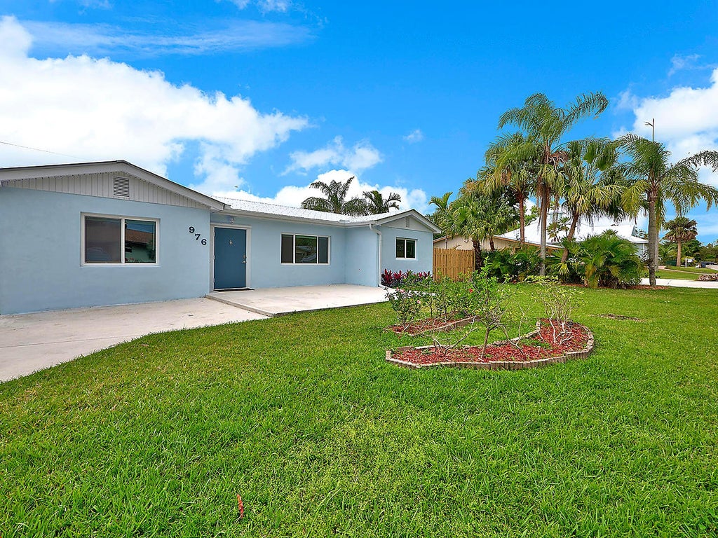 Photo of 976 SW 37TH Street, Palm City, FL 34990 (MLS # B26092268)