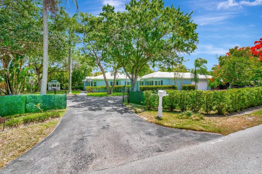 Tropical Paradise just minutes to South Florida's best beaches! Welcome to your dream home. Nestled in a prime location just minutes from Downtown Delray & one of the most beautiful beaches in Florida. This stunning 4 bedroom home offers the perfect blend of comfort, luxury, and resort style amenities. Step inside to a spacious & open layout, ideal for both relaxing & entertaining. The home features a fully equipped kitchen, elegant living spaces, & generously sized bedrooms. Outside, your private tropical retreat awaits. Lounge by the sparkling swimming pool, sip drinks under the tiki hut, or challenge friends to a game of putt-putt. When the sun sets, head inside for a game of billiards in the entertainment area. This home has it all-Location, lifestyle, & fun. Don't miss Out!