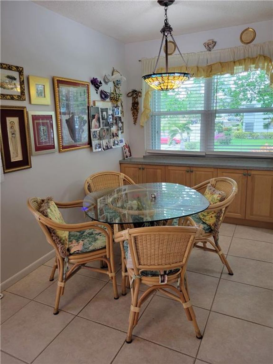 2nd floor corner, 2 bedrooms,1.5 bath. Partially furnished, floors are all tiled. This beautiful property on the water will be gone before you know it. Remodeled kitchen and baths. Master bath has a walk in shower. New hot water heater. New impact windows in Living room, Dinning room & Kitchen.