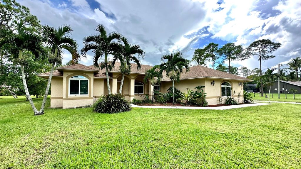 Photo of 15520 Key Lime Boulevard, Loxahatchee, FL 33470 (MLS # R10923269)