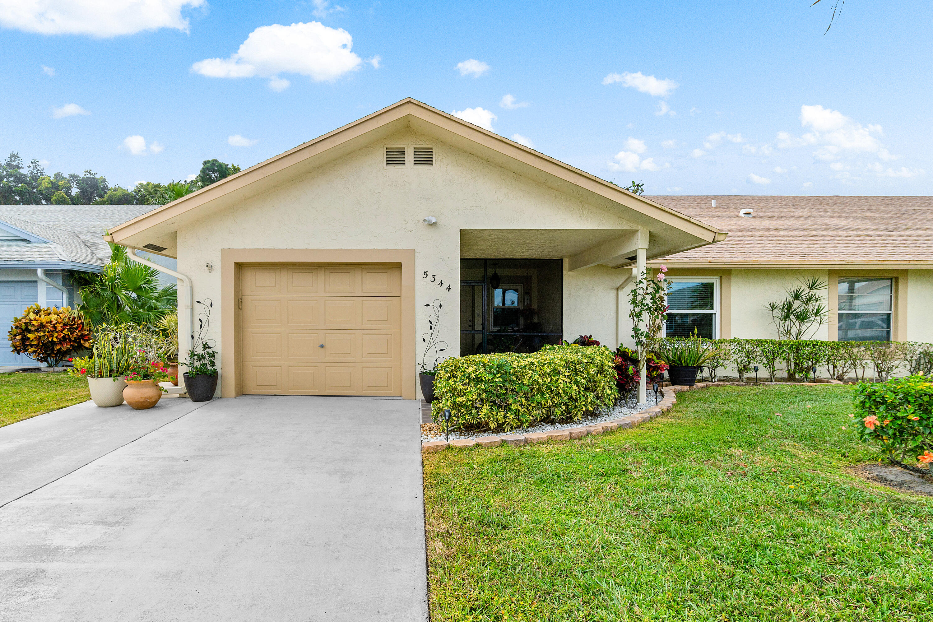 Welcome to Cypress Lakes, an active adult community with golf, tennis, clubhouse, pool, gym, sauna, and secure gated entry. This fully renovated 2-bed, 2-bath home with an office/den boasts a spacious open concept. The kitchen features stainless steel appliances, 42'' cabinets with built in drawers, and quartz countertops with a large island. Hurricane impact windows throughout and accordion shutters on the sliding glass doors. Enjoy the extended patio in the backyard. 1 car garage has penntek industrial coating. Move-in ready, schedule a showing today!