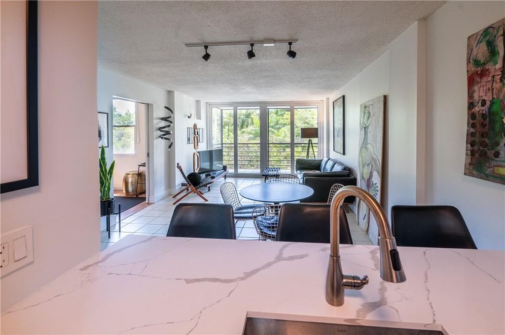 Photo of 107 Royal Park Dr #4E, Oakland Park, FL 33309 (MLS # F10381478)