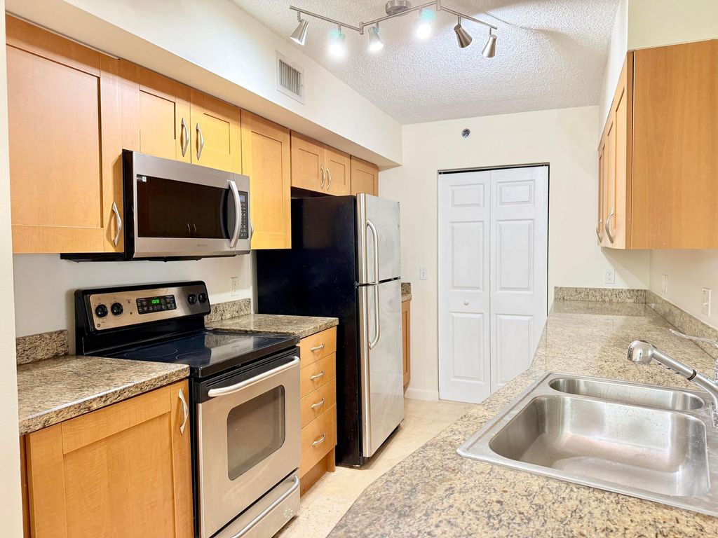 Photo of 3153 Clint Moore Road #108, Boca Raton, FL 33496 (MLS # B26027316)