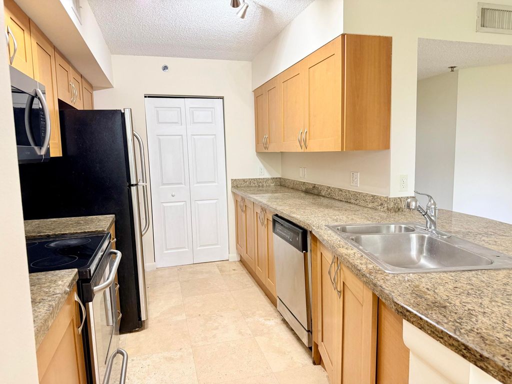 Photo of 3153 Clint Moore Road #108, Boca Raton, FL 33496 (MLS # B26027316)