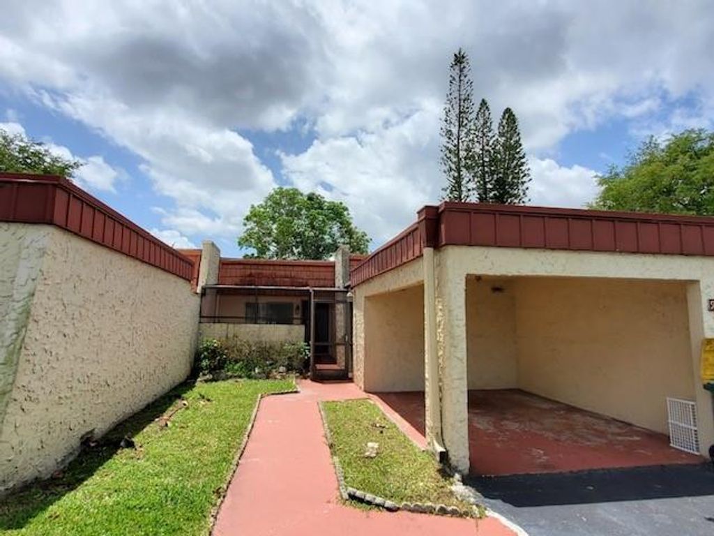 Photo of 9536 NW 65th St #8B, Tamarac, FL 33321 (MLS # F10327276)