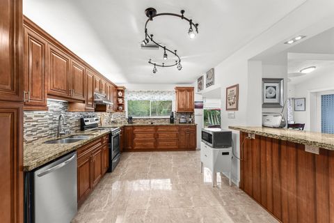 Photo of 6989 Quince Lane, Lake Worth, FL 33467 (MLS # R11137032)