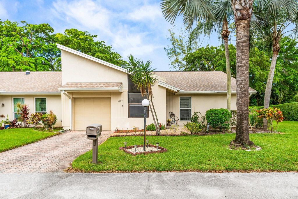 Photo of 6989 Quince Lane, Lake Worth, FL 33467 (MLS # R11137032)