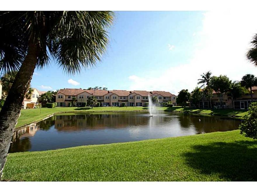 Scenic Lake View, Great Location & Gated,  in between I-441 & Turnpike, Immaculate maintained, Spacious 3-bedroom, Large & Bright Living room, Dine-In Kitchen, Tile downstairs & Carpet Upstairs, Large Patio, Long Drive way for parking, Clean and Move-in c ondition.  Easy for Showing.