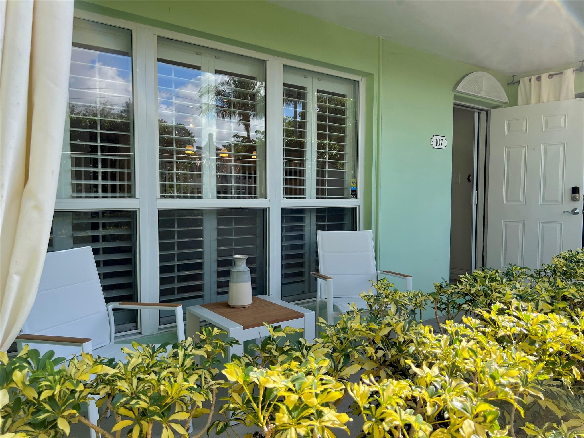 Wilton Wonder! Spacious 1 bedroom condo nestled in a boutique-style building just off Wilton Drive. Enjoy effortless access to restaurants, clubs, shopping, and vibrant nightlife. The unit features a covered front terrace and a semi-private back patio & yard, perfect for relaxation or entertaining. Impact windows and doors. Spacious living with oversized window completed w/plantation shutters throughout. The complex offers a heated pool surrounded by lush tropical landscaping. Additional perks include one assigned parking space, on-site laundry, BBQ & storage unit. The building allows 2 pets under 20 pounds, making it ideal for pet lovers. Rentals are permitted after just six months of ownership. Quick drive to Fort Lauderdale Beach & Airport. Easy to show use ShowingTime.